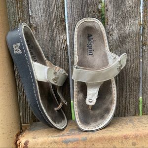 Alegria Metallic Gold Leather Thong Sandals with Black Platform